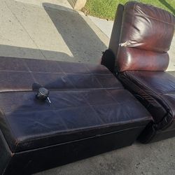 FREE LEATHER RECLINER AND FOLD OUT OTTOMAN BED