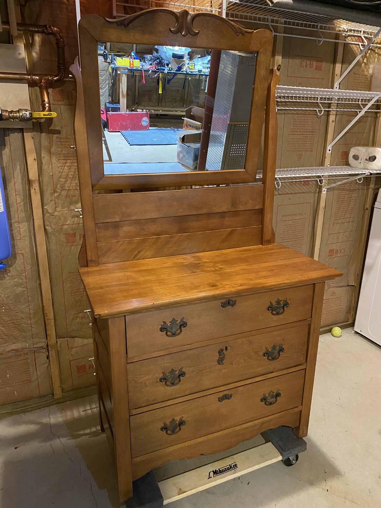 Antique Dresser With A Matching Mirror