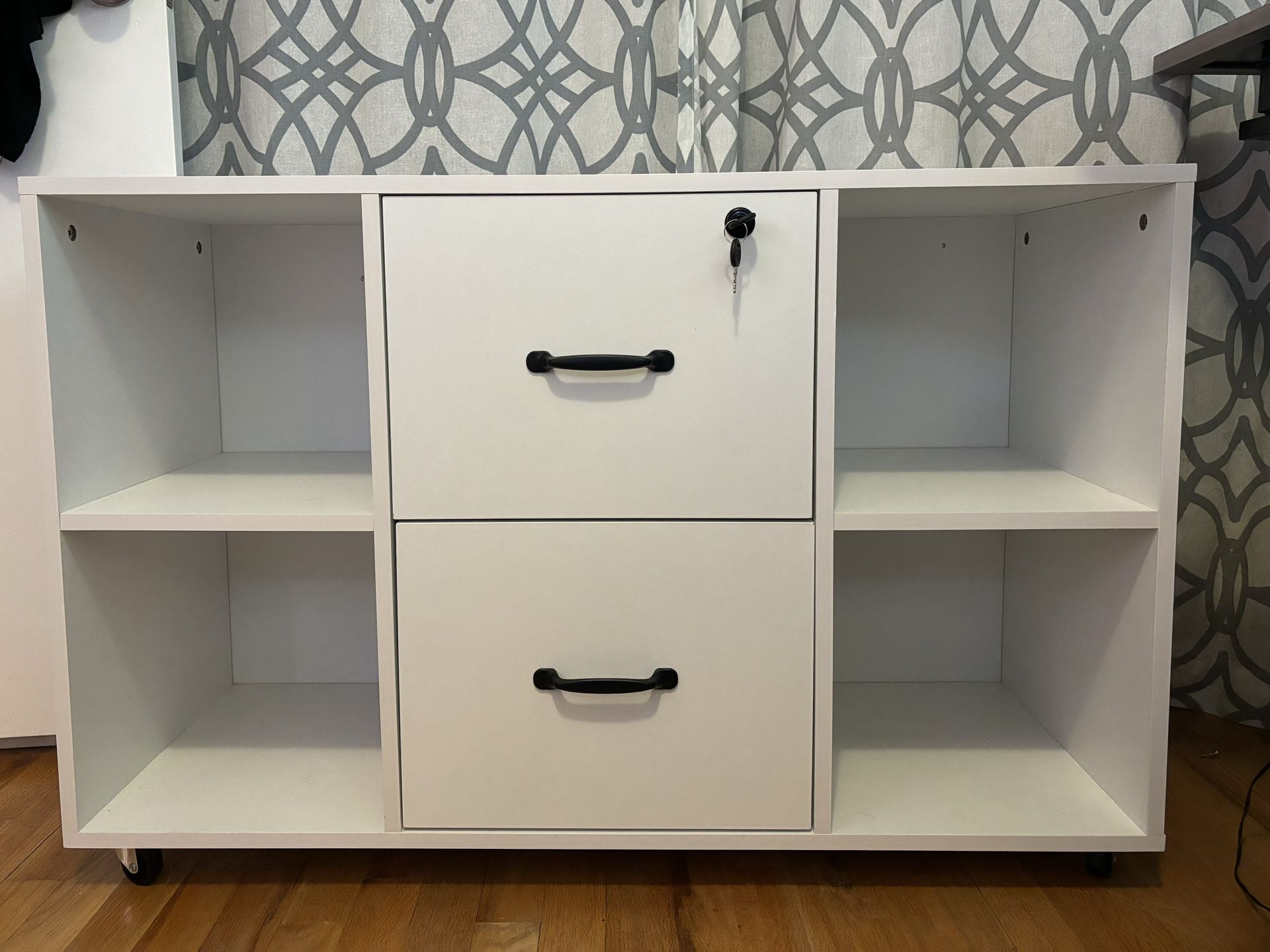 Two drawer filing cabinet with shelves and wheels