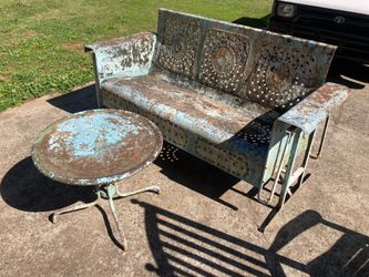 Vintage metal glider with round table solid true glider