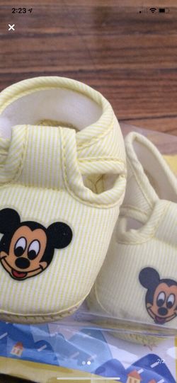 Brand new yellow Mickey Mouse shoes size 0-12 months $20