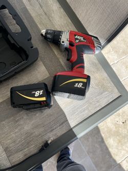 Drill With 2 Batteries And Charger And Box