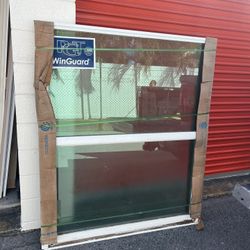 PGT Impact Bathroom Window 52x62 With Obscure 