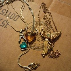 3 Necklaces 1with Bottles Charm 1with Angel 1with Heart Pendant In Perfect Condition