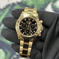 Rolex Daytona black dial Full Yellow gold 