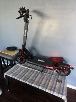 BHER SCOOTER ELECTRIC SPORT BRAN NEW I USED IT LIKE 3 TIMES