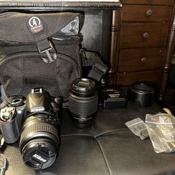 Nikon D3100 With Two Lenses And Accessories 