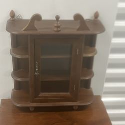 Display Cabinet Wood Glass Door Table Top Wall Hang Curio Shelf Knick Knack. Used in good condition with some cosmetic blemishes. These blemishes are 