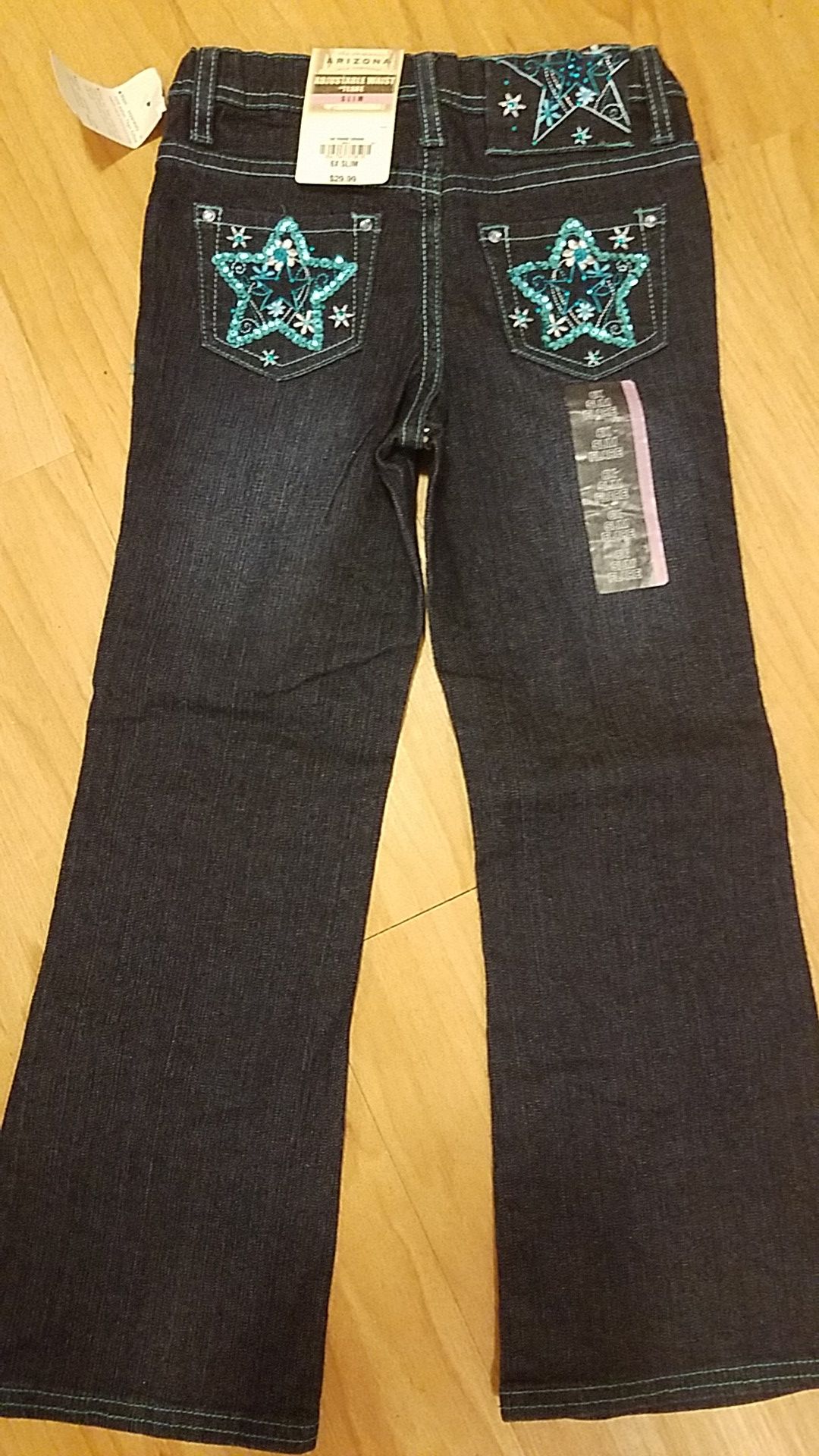 New with tags, girls size 6x slim flare jeans