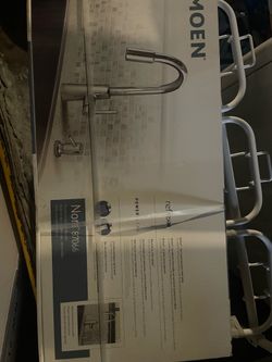 BRAND NEW MOEN RETRACTABLE FAUCET