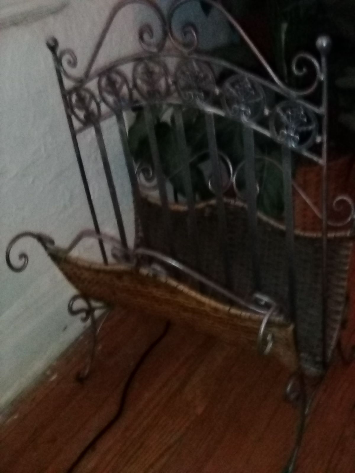 Metal and wicker magazine rack