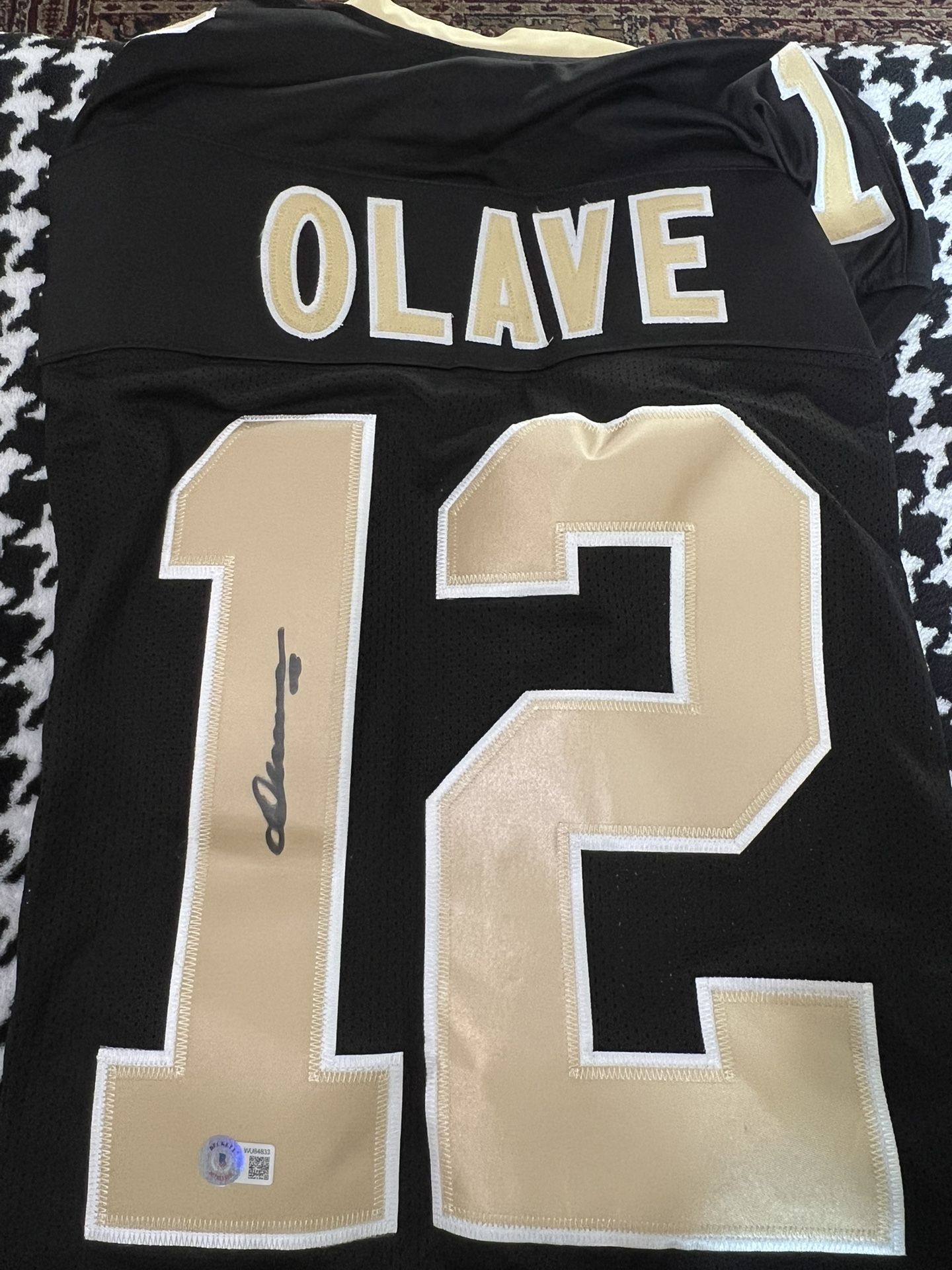 Chris Olave Autographed Custom Jersey Black and Gold Beckett Certified
