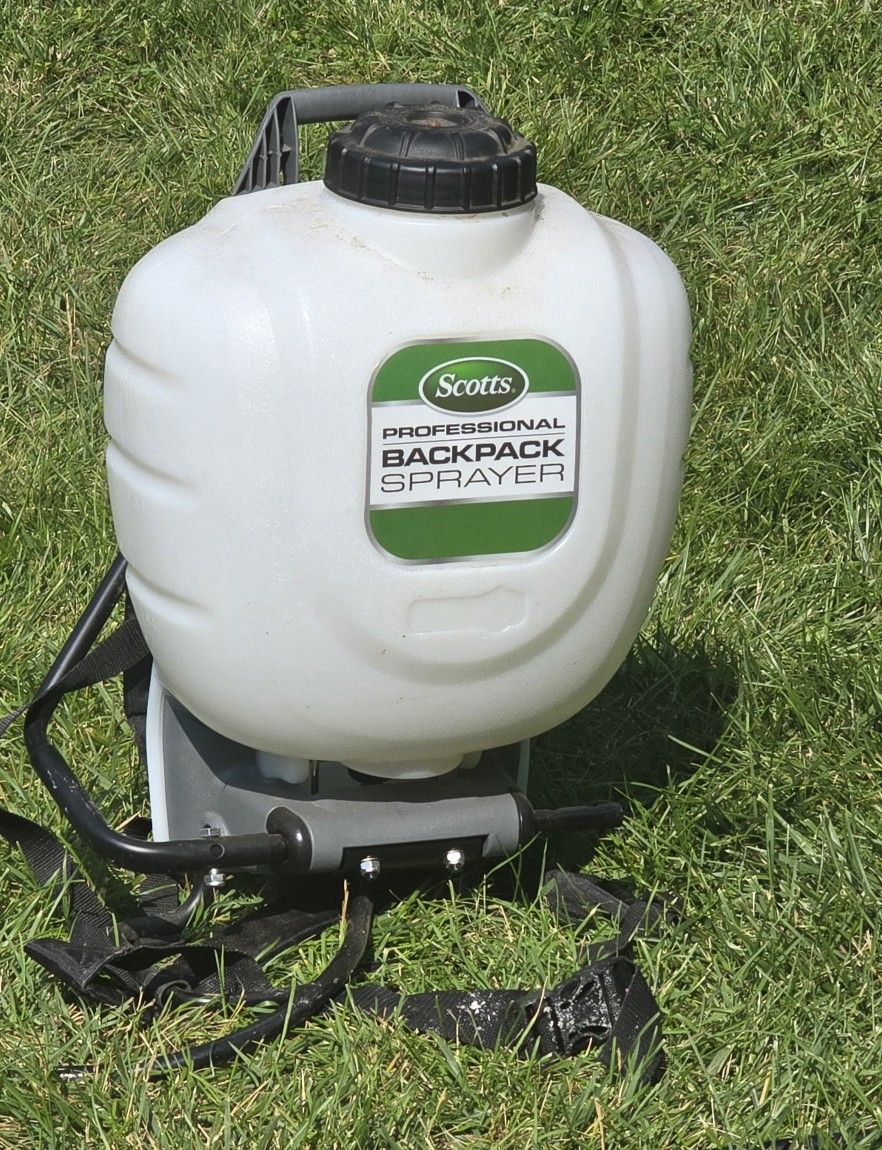 Scotts Professional Backpack Sprayer, specifically the 4-gallon model with a "No-Leak" design. 