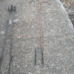 Plant Hanger & 2 TIKI TOURCHES.  PLANT HANGER 10.00 & $10.00 FOR BOTH TIKI TOURCHES.  Ok Condition PICKUP ONLY