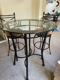 Bistro table with two chairs.