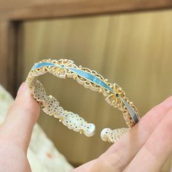 Golden enamel butterfly hollow flower silk