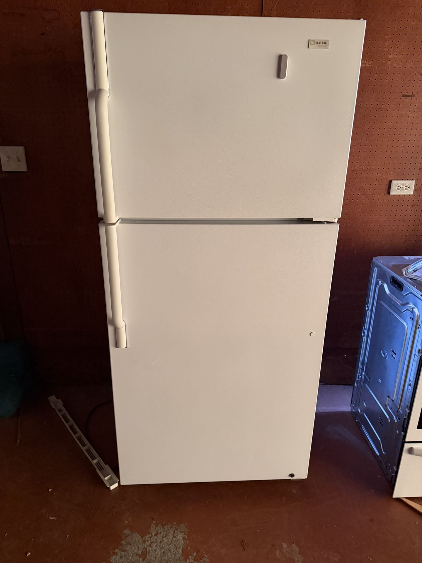 White Maytag Refrigerator. 