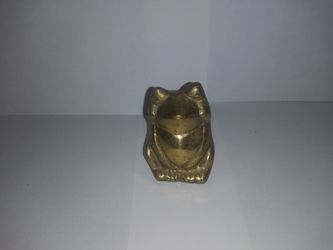 Two and a half silver paperweight bear