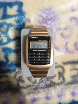 Gold Casio calculator watch
