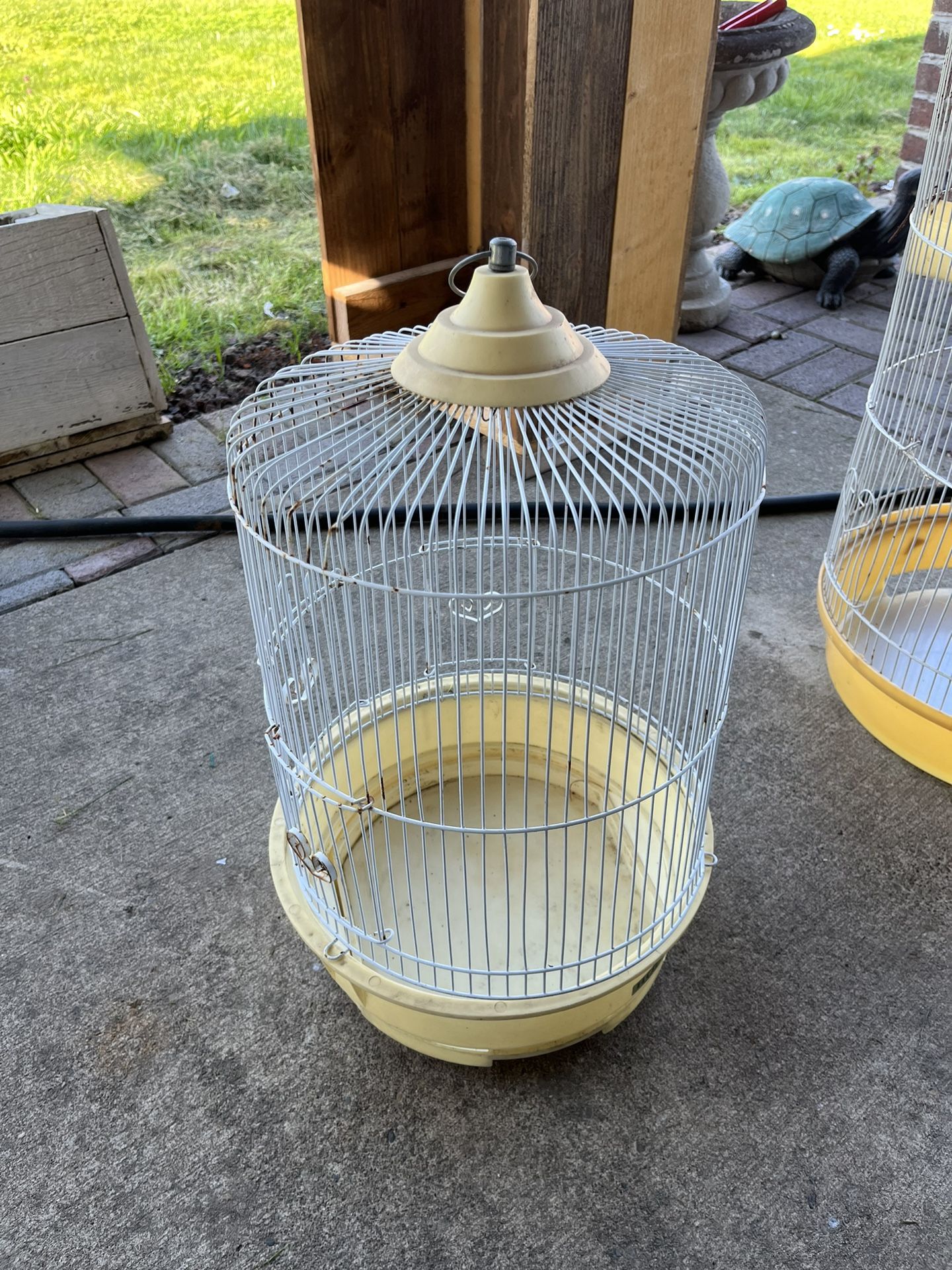 WHITE  BIRD CAGE  18 IN TALL ……12 WIDE   $10