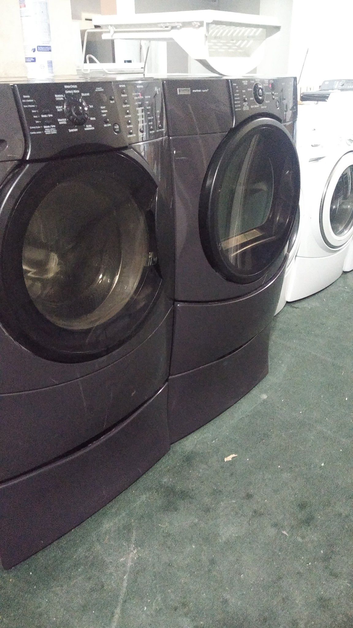 Kenmore washer and dryer set black colored on pedestal only asking $700 I can deliver comes with free install 60 days warranty