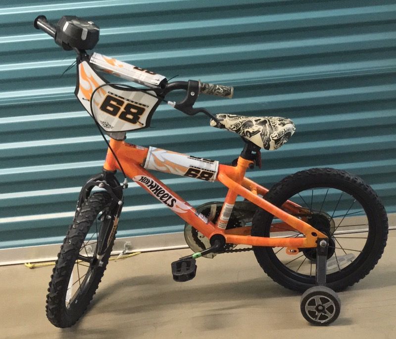 Orange hot best sale wheels bike