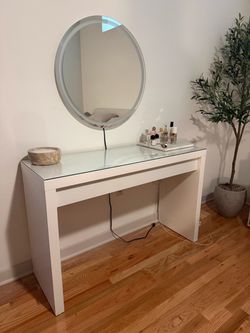 Vanity with glass layover