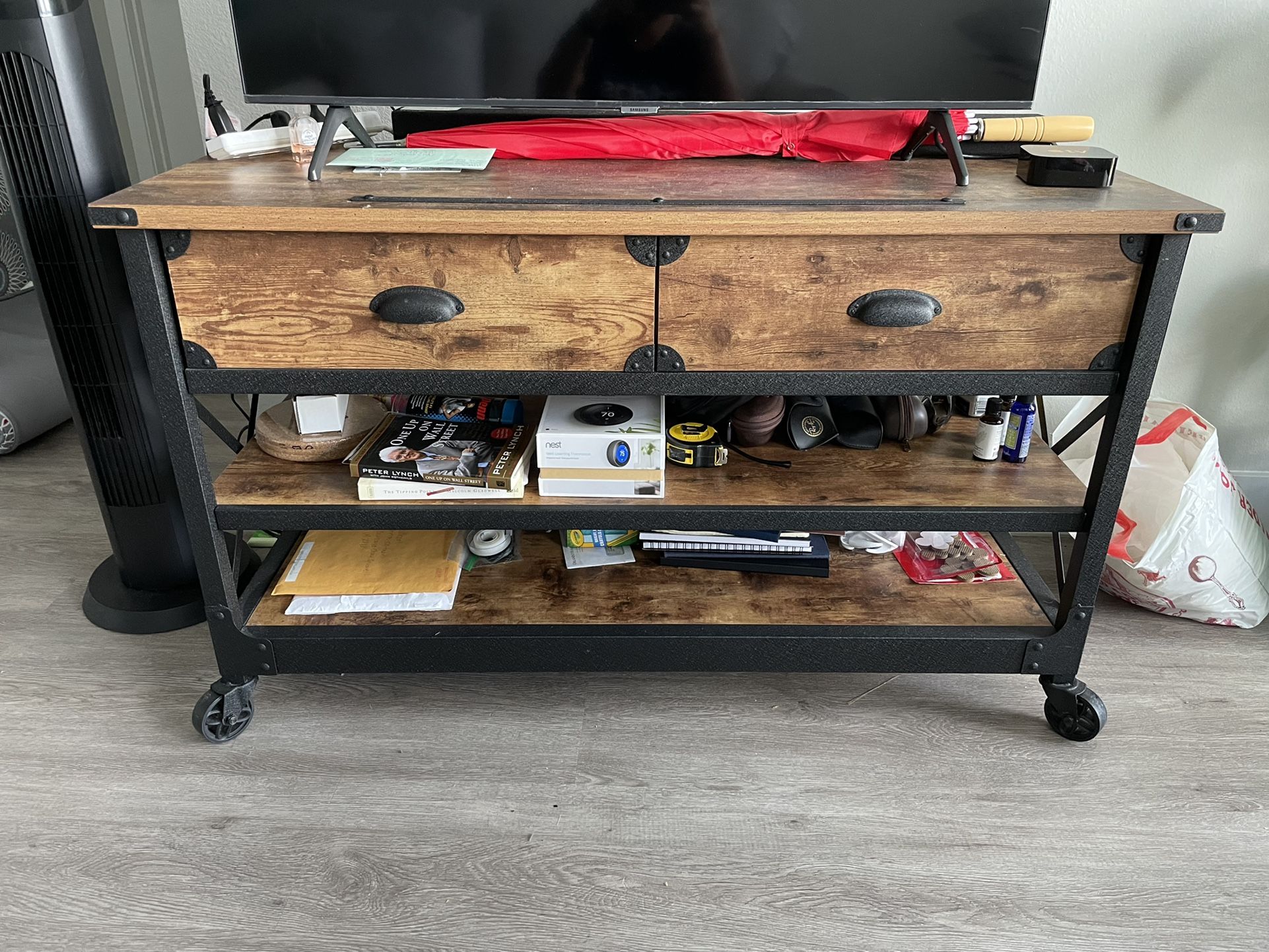 Rustic TV Stand With Wheels. Can fit 60 inch TV. In Excellent Condition