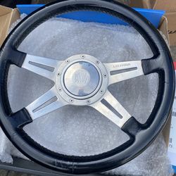 14” Lecarra steering wheel, GM Adapter, Boyd horn Botton, good condition, sell $95.00