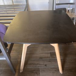 Black Table With Wooden Legs
