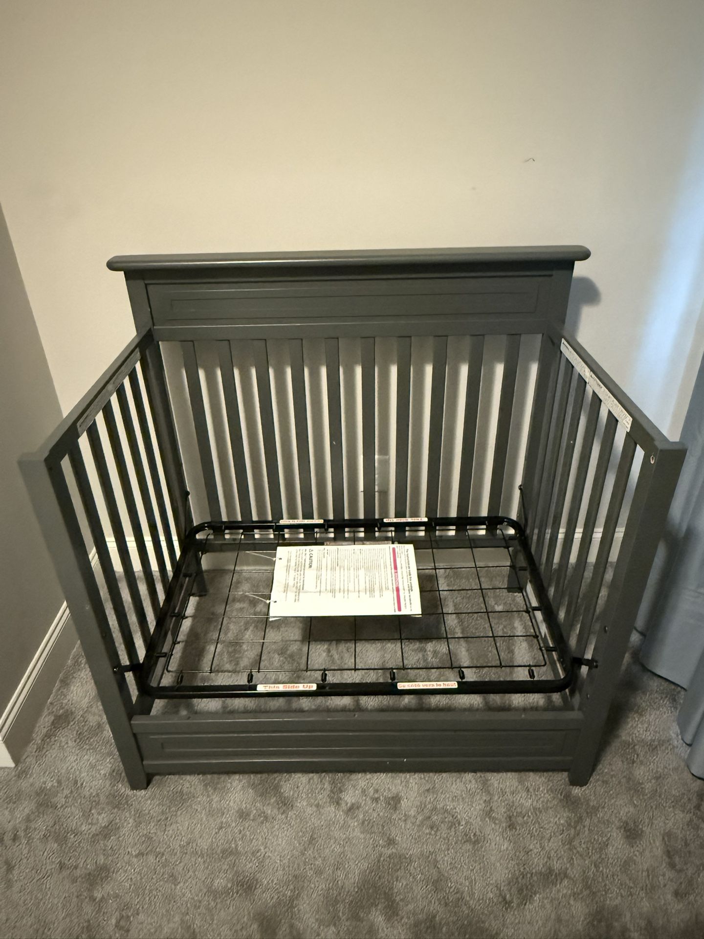 Storkcraft 4 in 1 Mini Crib