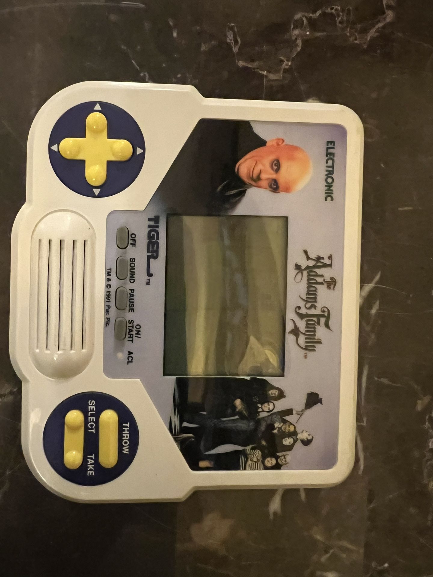 Early 90S Addams Family Handheld Game