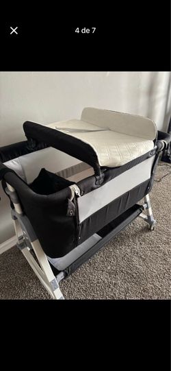 Bassinet and baby carrier like new both for $50
