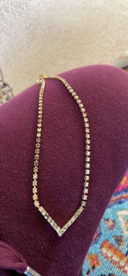 Gold colored Necklace with rhinestones