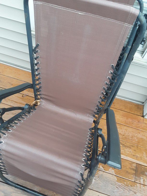 2 Brown Sling Lounge Chairs