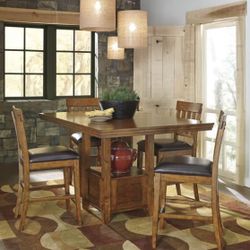 Counter height 5pc dining set solid wood medium brown 42-60”table (leaf included) and 4 matching chairs $599 (was $799, msrp $1,299)
