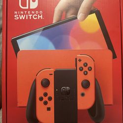 Nintendo Switch OLED Model Mario Red Edition console, carrying case, game, and accessories with grand theft auto trilogy