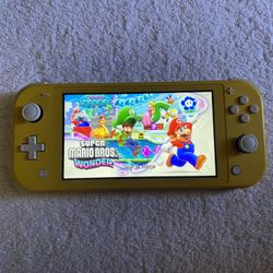NINTENDO SWITCH LITE + 55 SWITCH GAMES and 7500 RETRO GAMES