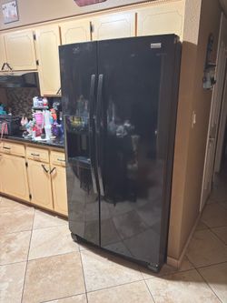 Black Kenmore Elite side by side Refrigerator