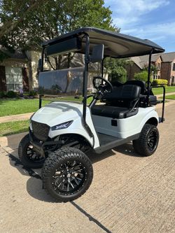 Premium EZGO Storm X4 Golf Cart - NEW BATTERIES! NAVITAS!