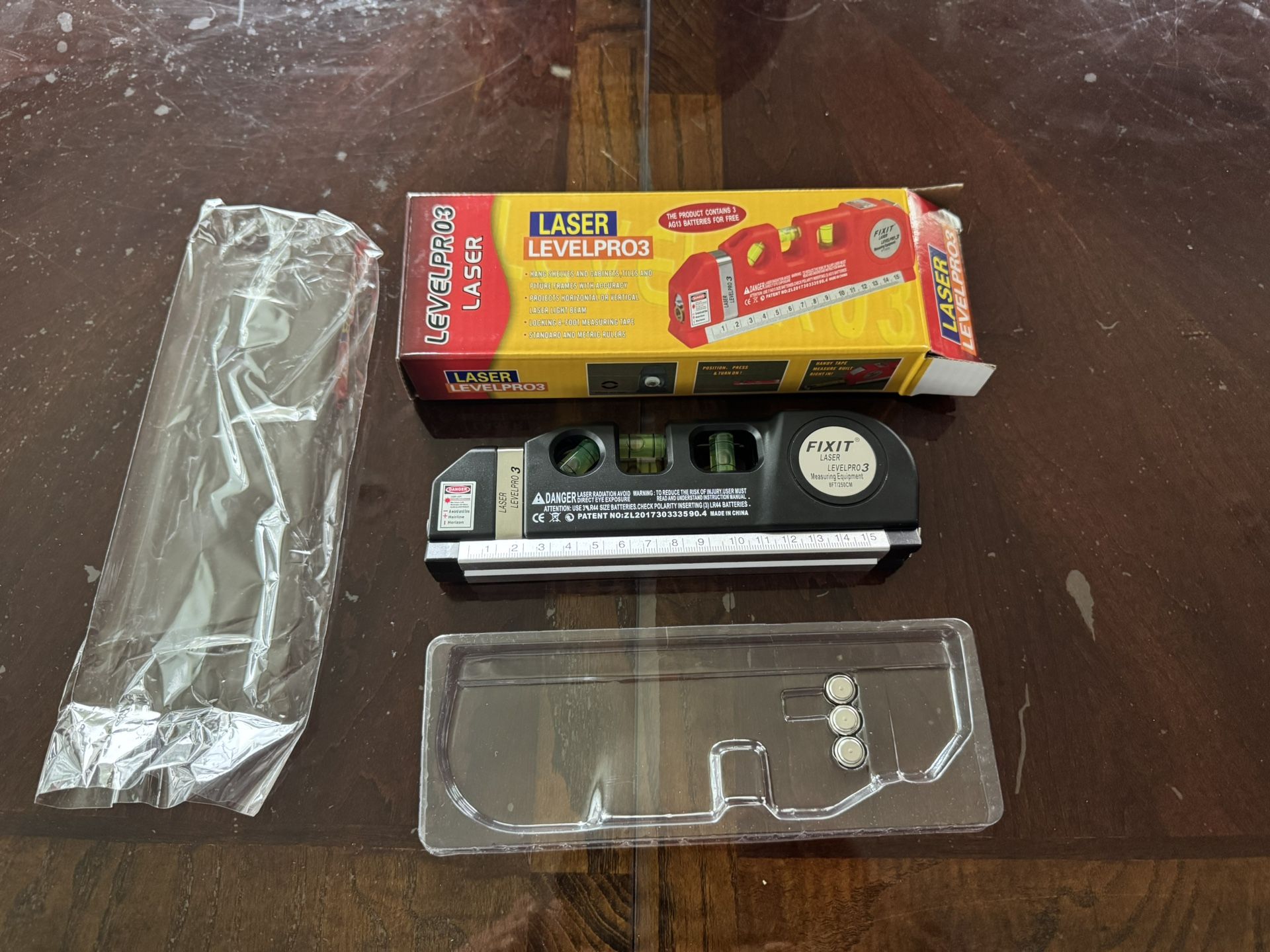 Laser leveler, and tape measure brand new in the box never use