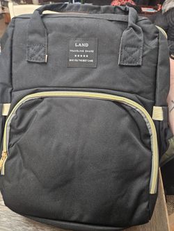 NEW Large Diaper bag with changing station/Bassinet.