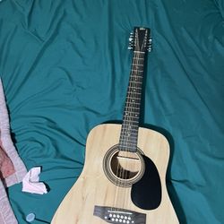 rouge 12 string acoustic Guitar