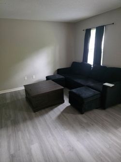 Black Sectional Sofa with Ottoman