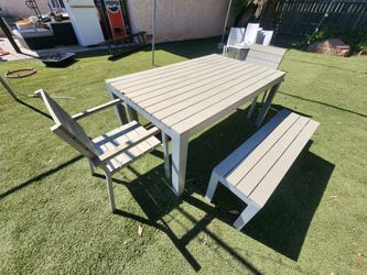 Ikea outdoor table set, pool lounge and side table.