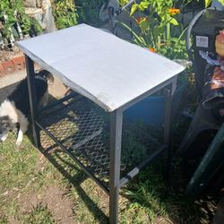 New Metal Table With A Shelf On The Bottom With New Glass Top