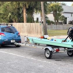 Solo Skiff With 5 Mercury, Garmin Custom Trailer.