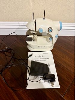 Mini Sewing Machine. Includes Foot Pedal, Power Adapter, 2 Bobbins, Operation Manual
