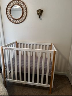 Delta mini crib
