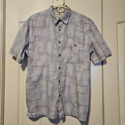 Vintage Island Shores men's short sleeve button down shirt size XL blue color with palm trees. This is in excellent condition!
